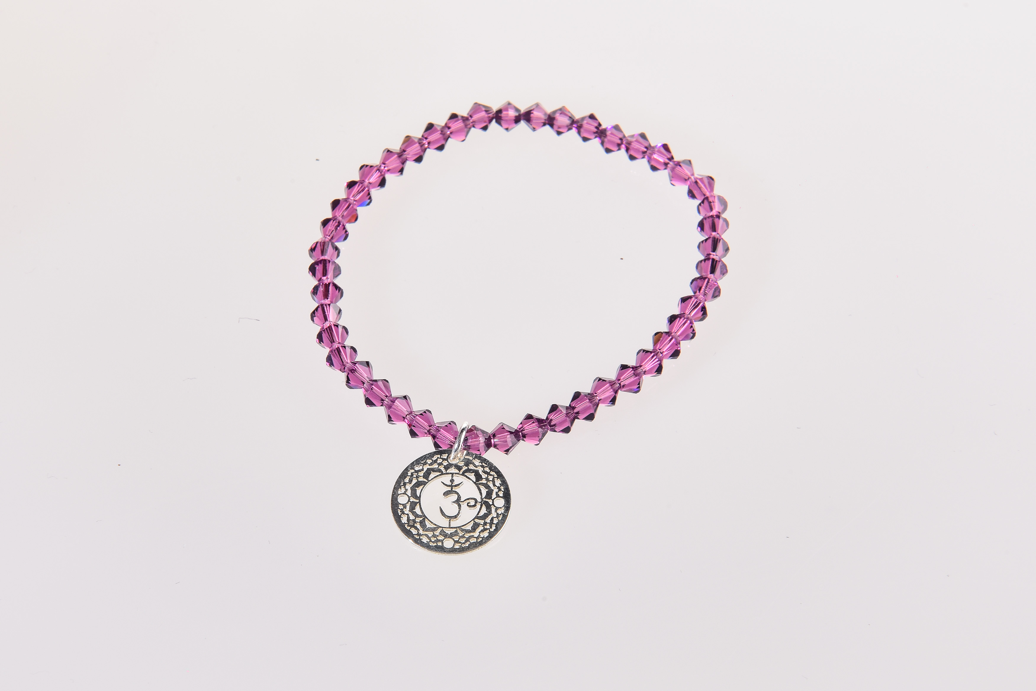 PULSERA CRISTAL SWAROVSKI  CON CHAKRA PLATA SAHASRARA ( VIOLETA )